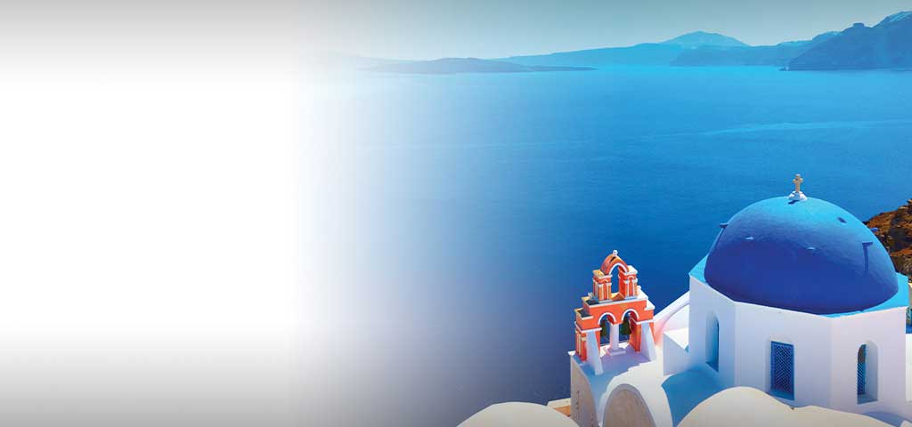 panoramic view of Santorini Greece roof top and the ocean