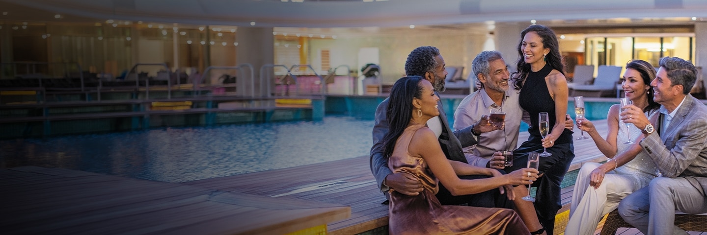 Group of friends lounging aboard a Regent cruise ship