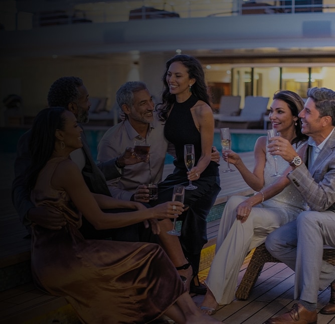 Group of friends lounging aboard a Regent cruise ship
