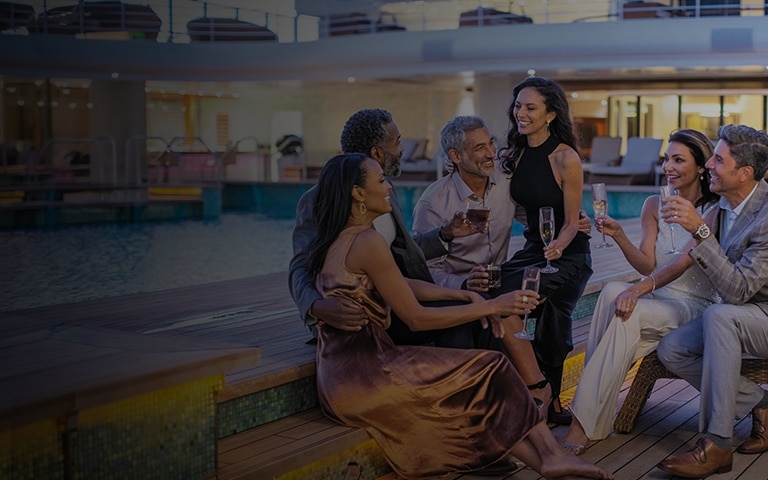 Group of friends lounging aboard a Regent cruise ship
