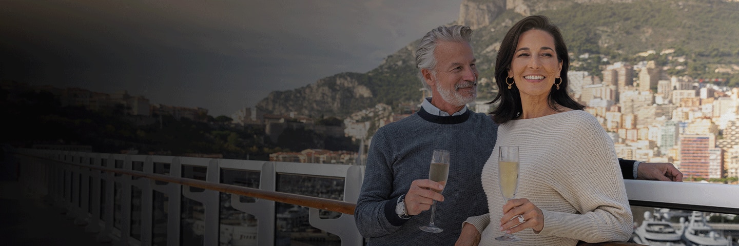 Older couple sailing on a luxury cruise ship
