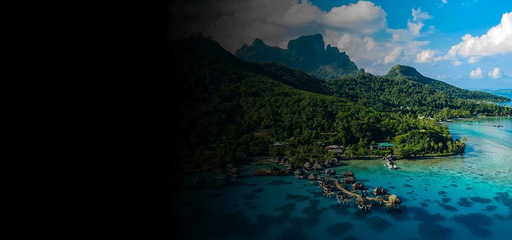 Overwater bungalows and lush mountains in Bora Bora, French Polynesia
