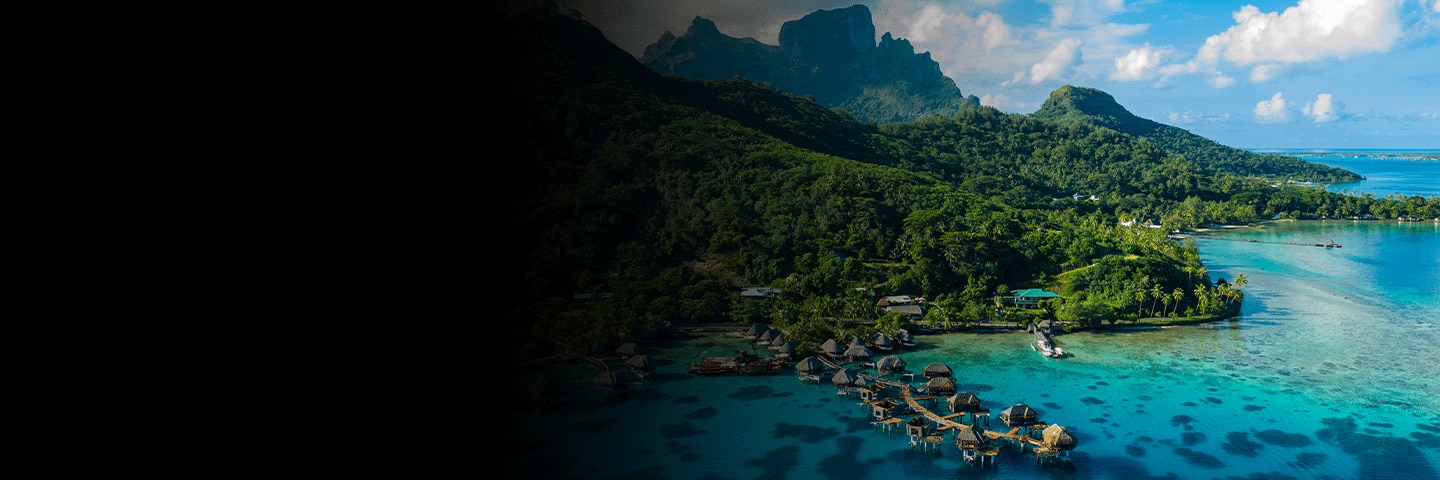 Overwater bungalows and lush mountains in Bora Bora, French Polynesia