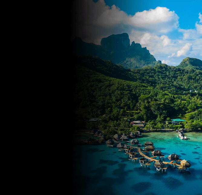 Overwater bungalows and lush mountains in Bora Bora, French Polynesia