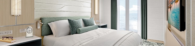 bed room aboard regent seven seas cruises on explorer class reimagined suite