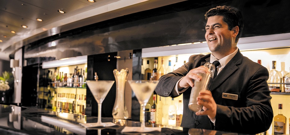 Regent bartender serving premium spirits