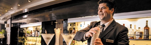 Regent bartender serving premium spirits