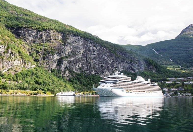 Regent Ship Sailing Through Norwegian Fjords