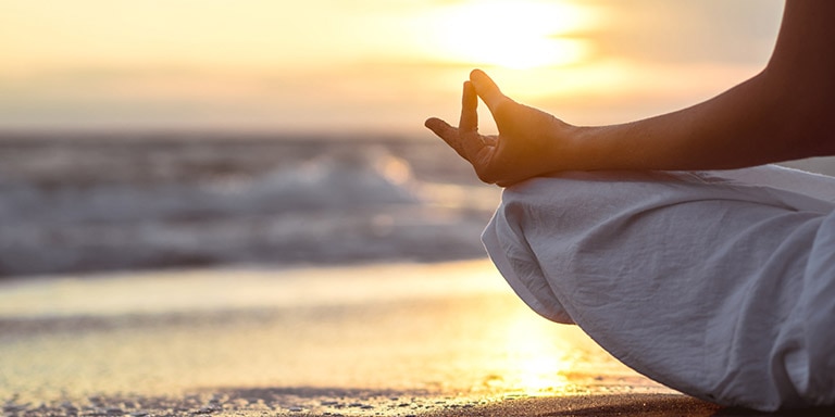 SUNSET YOGA BY THE SEA